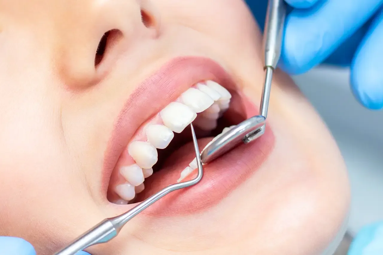 female-dentist-teeth-examination (1)webp